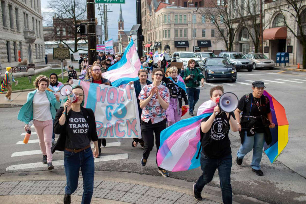 People gather for a rally organized by LGBTQ youth and adults in opposition to Senate Bill 150 and also to celebrate Trans Day of Visibility in Lexington, Kentucky, on March 31, 2022.