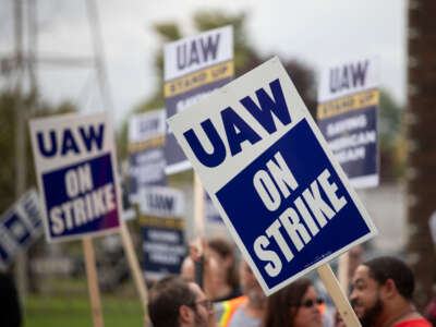 United Auto Workers members strike the General Motors Lansing Delta Assembly Plant on September 29, 2023, in Lansing, Michigan.