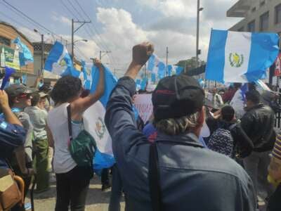 Guatemalans take part in an August 25 protest in Guatemala City to call for the attorney general's resignation due to election interference.