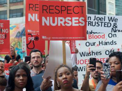 Hospital workers and supporters protest the closure of Hahnemann University Hospital at a rally in Philadelphia, Pennsylvania, on July 11, 2019.