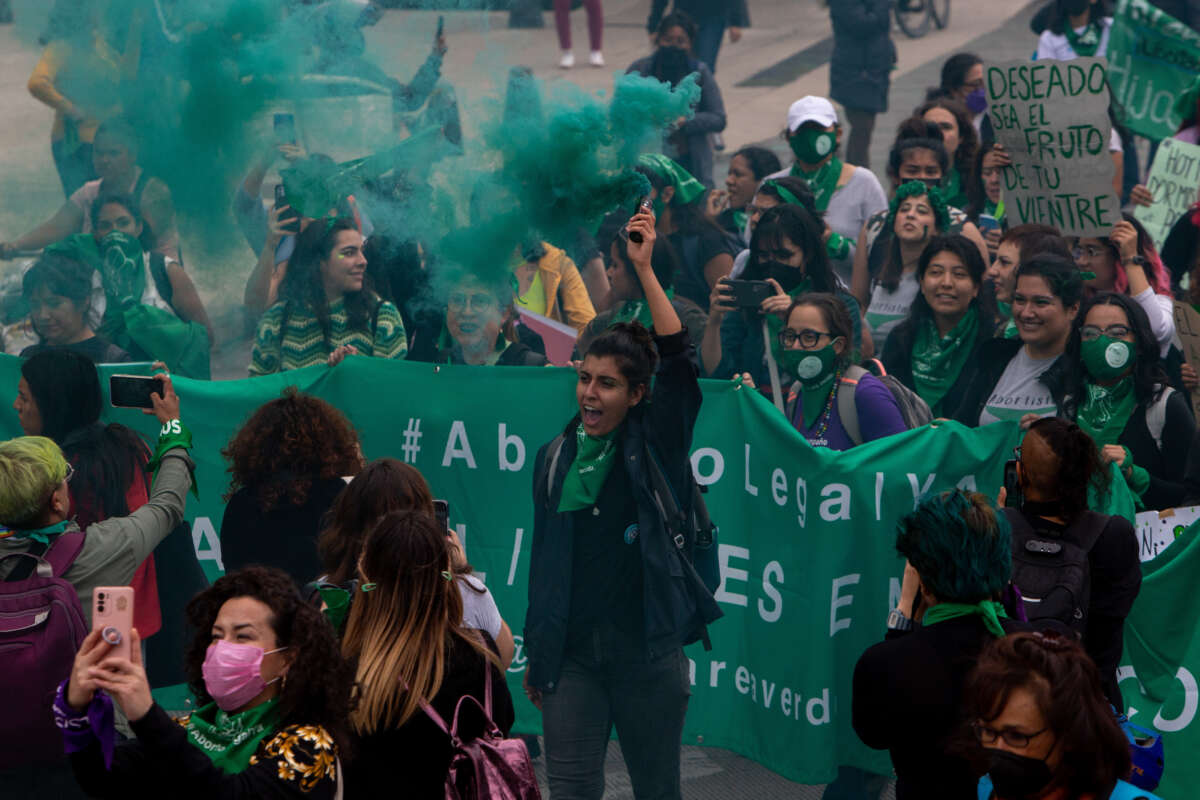 Women from various feminist collectives take part during a demonstration in the Zócalo of Mexico City within the framework of the Global Day of Action for Access to Legal, Free, Safe and Free Abortion that seeks to decriminalize this practice to prevent more deaths from clandestine abortion practices. on September 28, 2022 in Mexico City, Mexico. (Photo credit should read Alex Dalton/ Eyepix Group/Future Publishing via Getty Images)