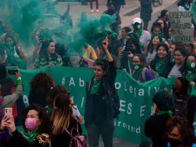 Women from various feminist collectives take part during a demonstration in the Zócalo of Mexico City within the framework of the Global Day of Action for Access to Legal, Free, Safe and Free Abortion that seeks to decriminalize this practice to prevent more deaths from clandestine abortion practices. on September 28, 2022 in Mexico City, Mexico. (Photo credit should read Alex Dalton/ Eyepix Group/Future Publishing via Getty Images)