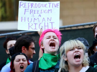 Abortion rights supporters protest the U.S. Supreme Court decision to end federal abortion rights protections outside the First Street U.S. Courthouse in Los Angeles, California, on June 27, 2022.