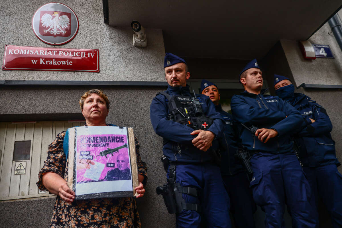 A woman holds a banner while demonstrating outside a police station during 'Solidarity with Joanna' protest in Krakow, Poland on July 25, 2023. Rallies were held in Polish cities after alleged police hostility against a woman named Joanna who took abortion pill. After Joanna's psychiatrist called 112 fearing for her weak mental health, Joanna was taken to the hospital in the escort of the police officers who interrogate her in a humiliating way.