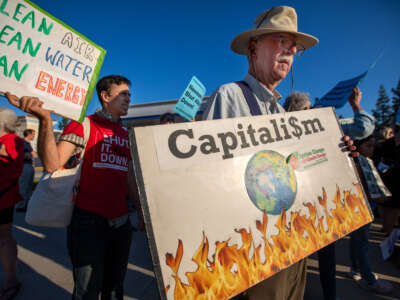 David Klein participates in a rally calling on Gov. Gavin Newsom to follow through on his pledge to shut down the Aliso Canyon gas storage field on August 22, 2023, in Los Angeles, California.