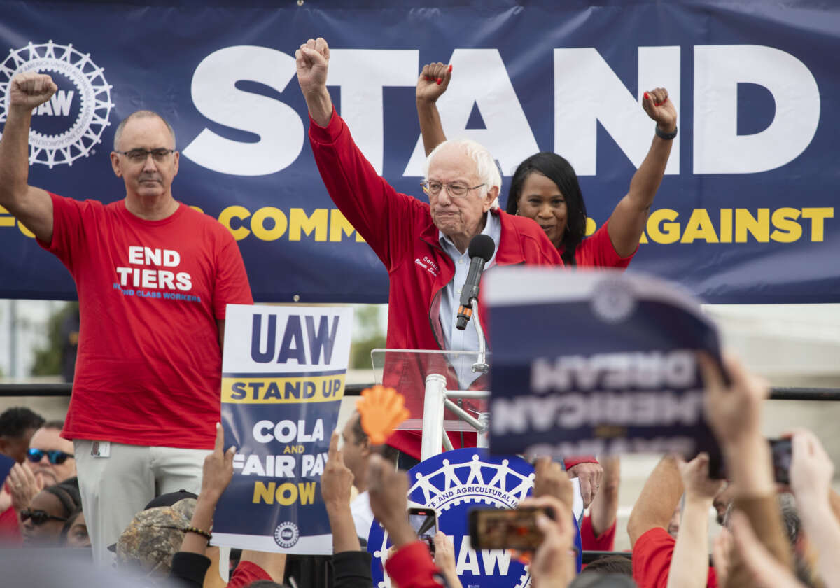 Sen. Bernie Sanders and UAW President Shawn Fain speak at a rally in support of United Auto Workers members