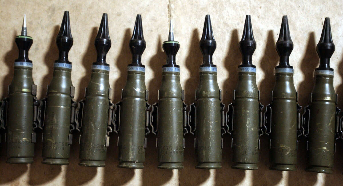 A row of U.S. Army 25mm rounds of depleted uranium ammunition in Tikrit, Iraq, on February 11, 2004.
