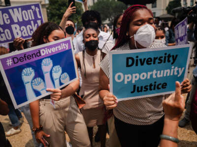 Affirmative action supporters and and counterprotesters rally outside of the Supreme Court of the United States on June 29, 2023, in Washington, D.C.