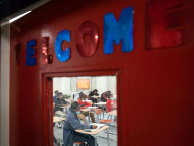 Students take part in an 8th grade math class at West Bolivar High School in Rosedale, Mississippi, on September 23, 2022. Students at McEvans School in Shaw joined the class via Zoom due to teacher shortages.