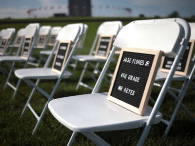 Empty chairs displaying the names of students killed during school shootings are shown during an event on the National Mall calling for action on preventing gun violence on September 13, 2023, in Washington, D.C.
