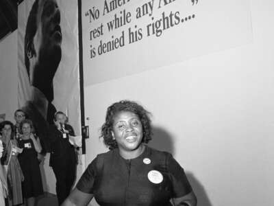 Fannie Lou Hamer enters the convention hall entrance to the National Democratic Convention in Atlantic City, New Jersey, on August 25, 1964.