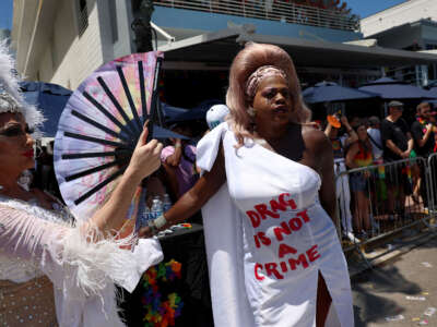 Tiffany Fantasia wears a dress with the words, 'Drag Is Not a Crime,' written on it during the 15th annual Miami Beach Pride Celebration parade on April 16, 2023, in Miami Beach, Florida.