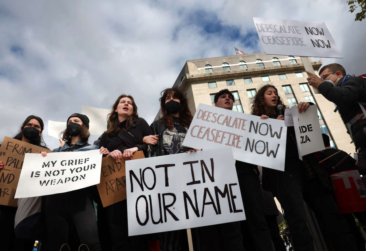 Protestors block access to Pennsylvania Ave. near the White House during a demonstration to support Gaza on October 16, 2023, in Washington, D.C.