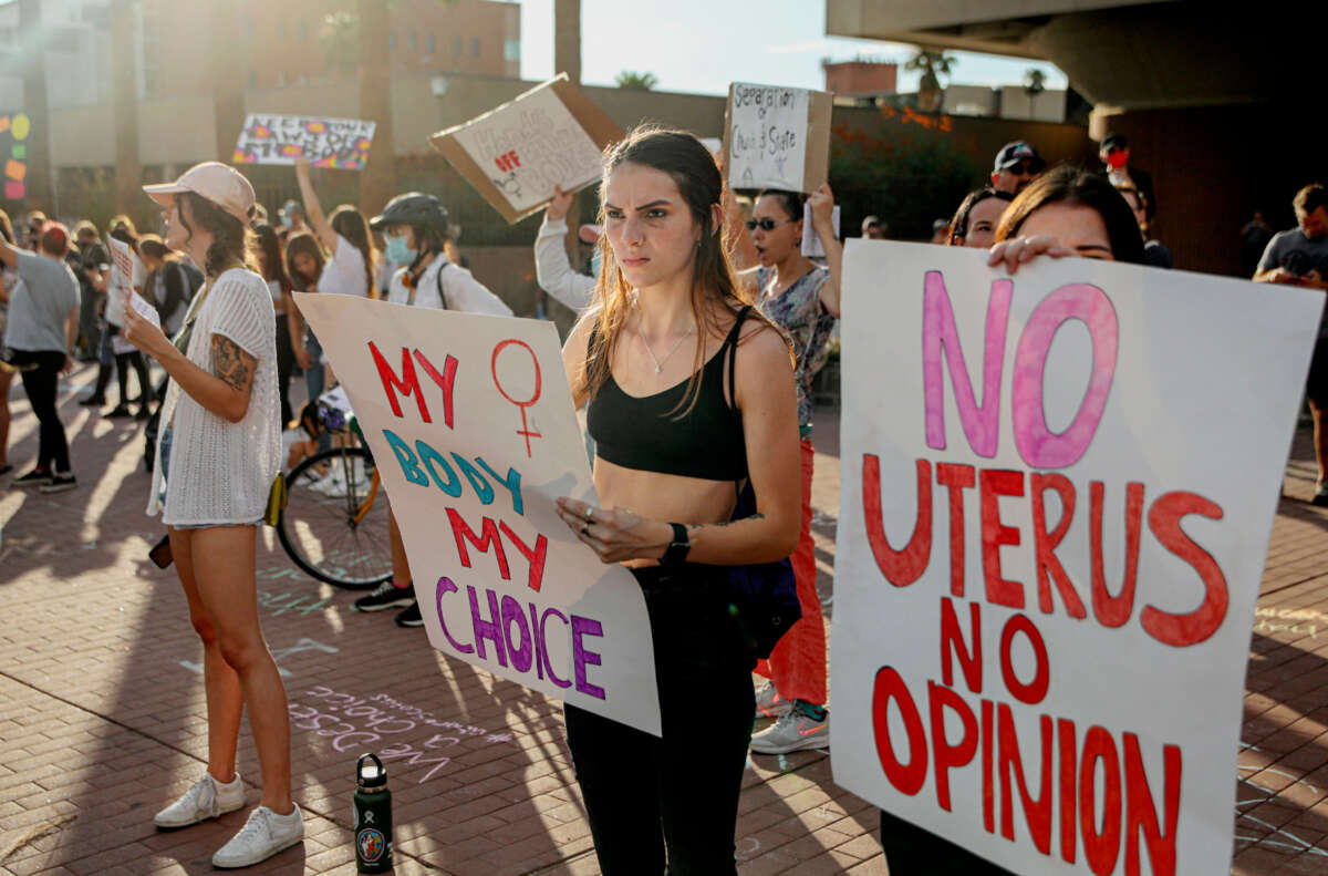 Abortion rights protesters chant during a rally at the U.S. District Court of Arizona in Tucson, Arizona, on July 4, 2022.