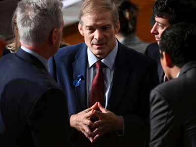 Rep. Jim Jordan speaks with Rep. Kevin McCarthy as members of the U.S. House of Representatives gather for a second round of voting for the next speaker at the U.S. Capitol on October 18, 2023, in Washington, D.C.