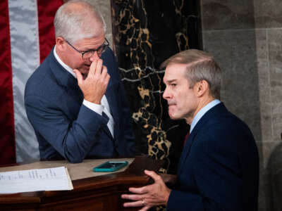 Speaker pro tempore of the House Patrick McHenry, left, and Rep. Jim Jordan, Republican nominee for speaker, are seen on the House floor of the U.S. Capitol before a second ballot in which Jordan failed to receive enough votes to win the position on October 18, 2023.