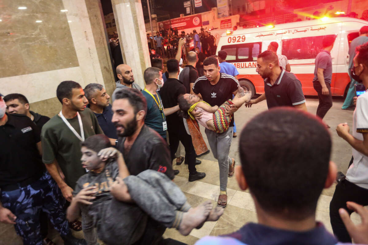 Palestinians injured in Israeli air raids arrive at Nasser Medical Hospital on October 24, 2023, in Khan Yunis, in the southern Gaza Strip, Gaza.