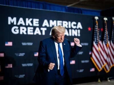 Former President Donald Trump dances after speaking at a campaign rally on October 23, 2023, in Derry, New Hampshire.