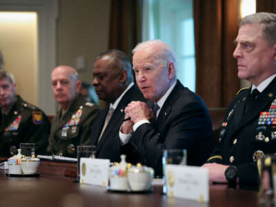 President Joe Biden meets with meets with Secretary of Defense Lloyd Austin (3rd left), Chairman of the Joint Chiefs of Staff Gen. Mark Milley (right), members of the Joint Chiefs of Staff, and combatant commanders in the Cabinet Room of the White House on April 20, 2022, in Washington, D.C.