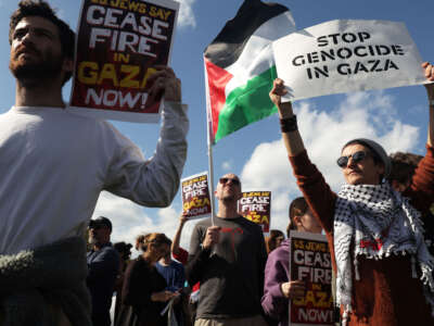 Members of the Jewish Voice for Peace and the IfNotNow movement stage a demonstration in support of a ceasefire against the Palestinians in Gaza at the National Mall on October 18, 2023, in Washington, D.C.