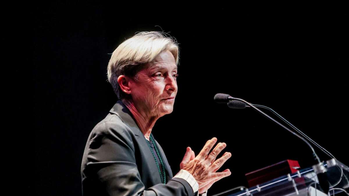 Judith Butler speaks at a podium