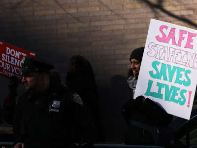 Nurses from Mount Sinai Hospital strike outside the hospital on January 9, 2023, in New York City.
