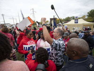 United Auto Workers President Shawn Fain greets UAW members as they strike the General Motors Lansing Delta Assembly Plant on September 29, 2023, in Lansing, Michigan.