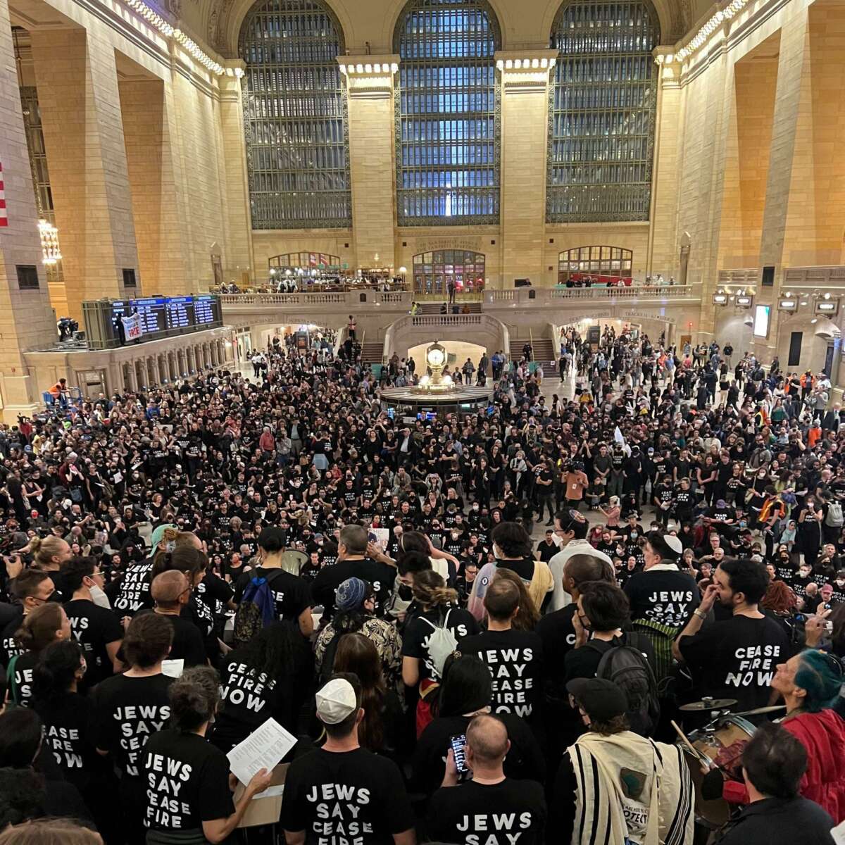 Protesters stage a massive sit-in at Grand Central Station demanding ceasefire.