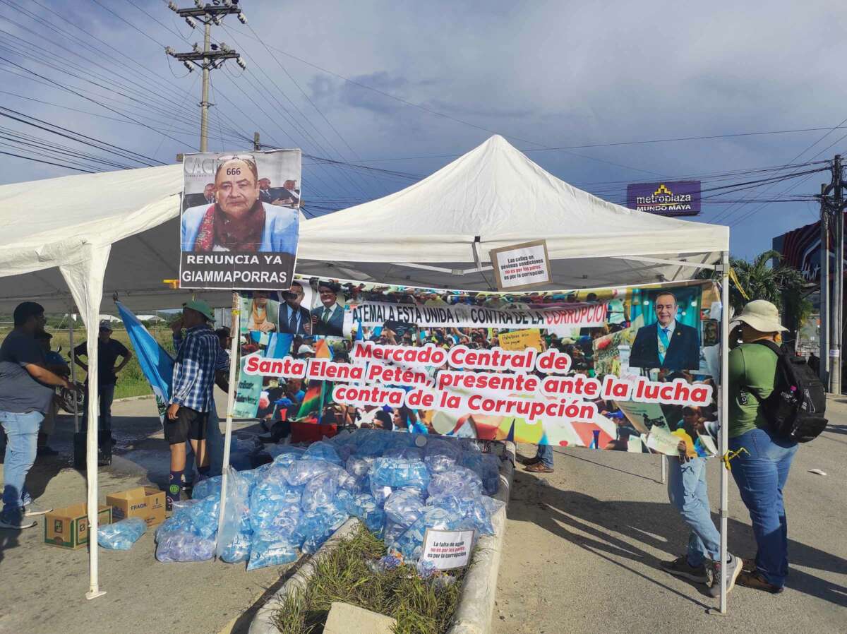 Bags of donated water are stacked up at a protest blockade in Santa Elena, Petén, nearly 300 miles north of Guatemala City.