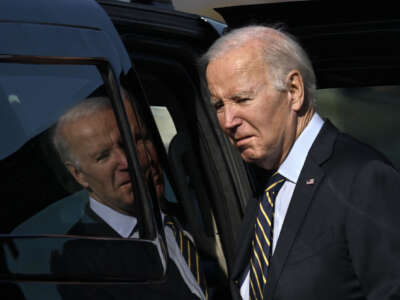 President Joe Biden walks to his vehicle after arriving at Delaware Air National Guard Base in New Castle, Delaware, on November 6, 2023.