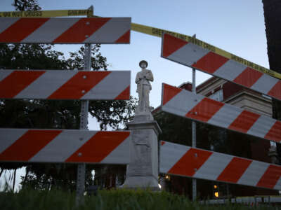 Barricades surround the Confederate monument in front of the Hernando County Courthouse to keep possible protesters away from the statue, on August 19, 2017, in Brooksville, Florida.