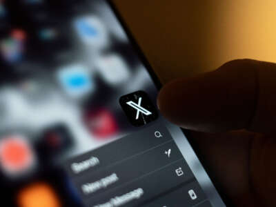 The X app, formerly known as Twitter is seen on a phone.