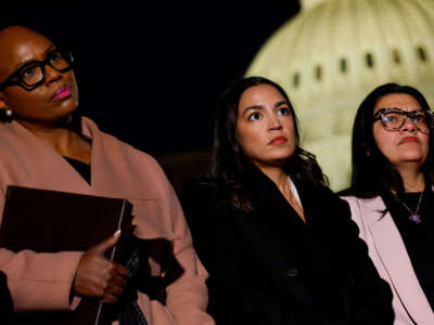 Rep. Ayanna Pressley, Rep. Alexandria Ocasio-Cortez and Rep. Rashida Tlaib listen during a news conference calling for a ceasefire in Gaza outside the U.S. Capitol building on November 13, 2023, in Washington, D.C.