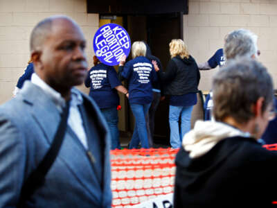 NOW activists shield patients from anti-abortion activists outside the Abortion and Contraceptic Clinic in Omaha, Nebraska, in August, 2009.