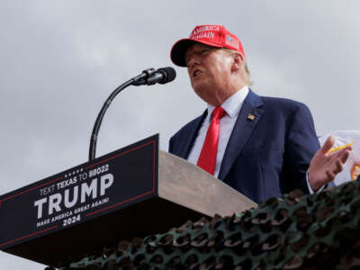 Former President Donald Trump gives remarks at the South Texas International airport on November 19, 2023, in Edinburg, Texas.