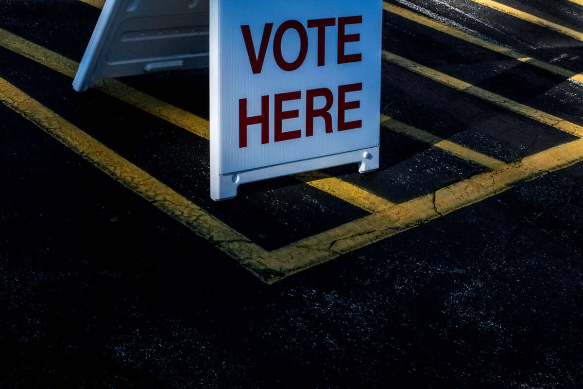A 'Vote Here' sign is on display on Wisconsin's state primary day on August 9, 2022, at the Village Hall of Waukesha in Waukesha, Wisconsin.