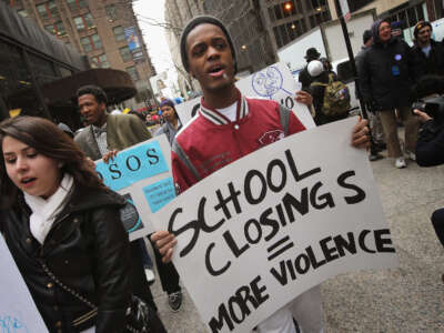 Students march through the Loop protesting the city's plan to close more than 50 elementary schools on March 25, 2013, in Chicago, Illinois.