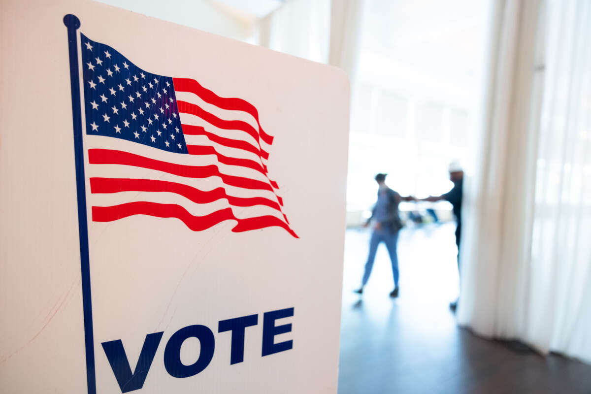 Voters leave the Park Tavern polling location after casting their ballots in the Georgia primary election on May 24, 2022, in Atlanta, Georgia.