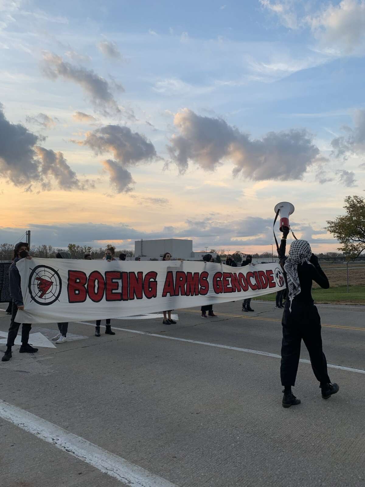 Organizers block the largest entrance to the Boeing 598 facility to prevent people from entering the building.