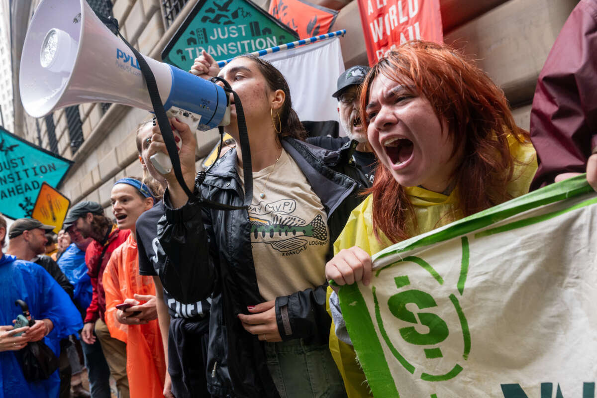 Climate activists hold a demonstration in the Financial District of Manhattan