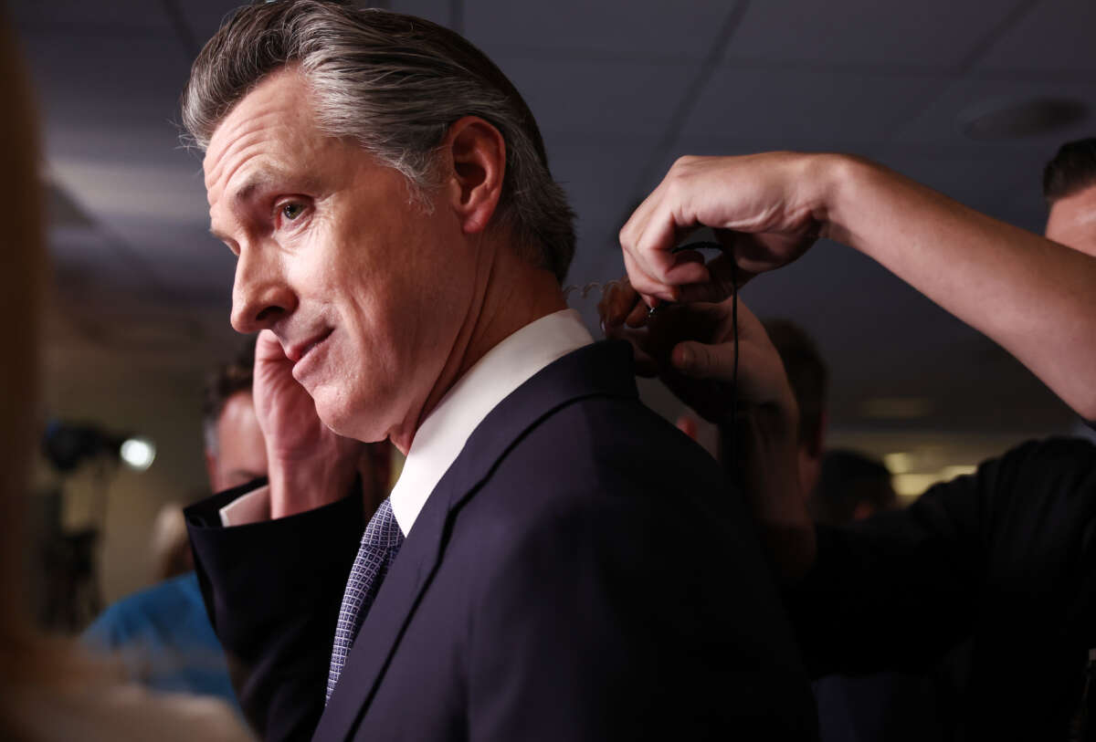 California Gov. Gavin Newsom prepares for an interview in the spin room following the FOX Business Republican Primary Debate at the Ronald Reagan Presidential Library on September 27, 2023, in Simi Valley, California.