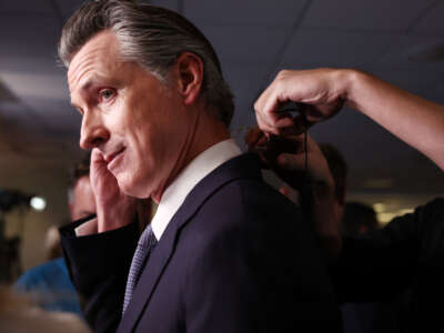 California Gov. Gavin Newsom prepares for an interview in the spin room following the FOX Business Republican Primary Debate at the Ronald Reagan Presidential Library on September 27, 2023, in Simi Valley, California.