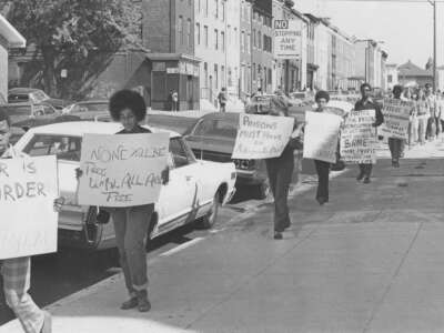 Protesters marching during a protest against the suppression of the Attica Prison uprising on September 28, 1971.