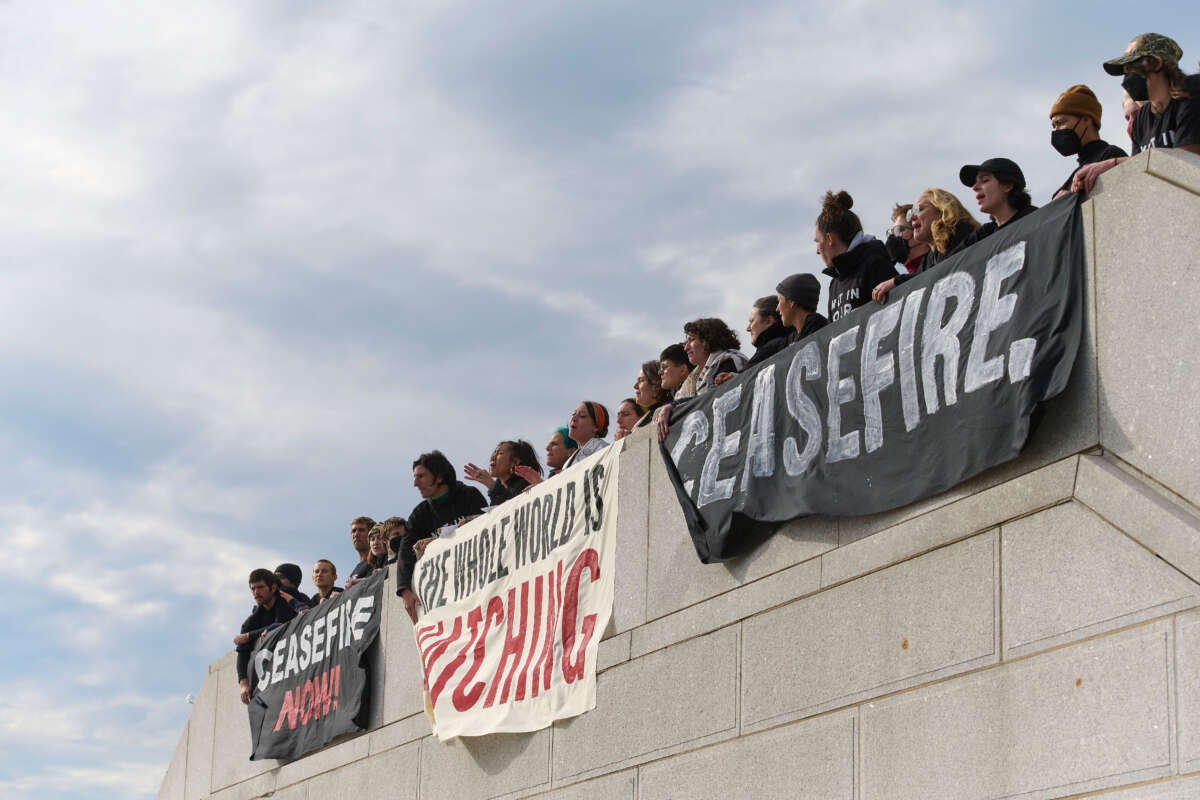 Jewish Voice for Peace protesters call for a ceasefire in Gaza outside the Statue of Liberty.