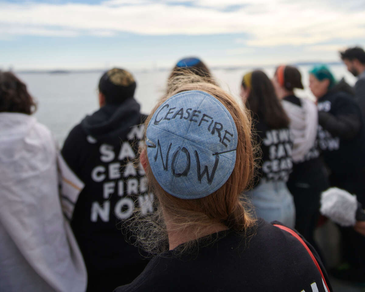 Jewish Voice for Peace protesters call for a ceasefire in Gaza outside the Statue of Liberty.