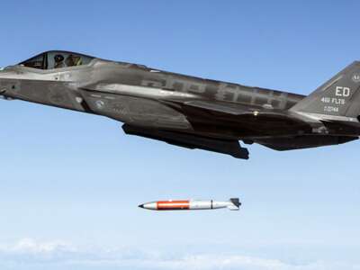 An F-35 drops an inert B61-12 nuclear bomb.