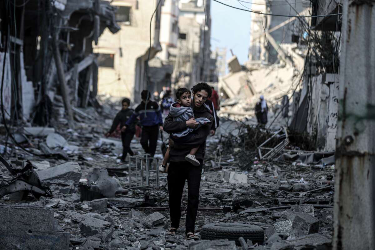 Palestinians flee to safer areas following Israeli bombardments on southern part of Gaza City, Tel al-Hawa neighborhood, Gaza on October 16, 2023.