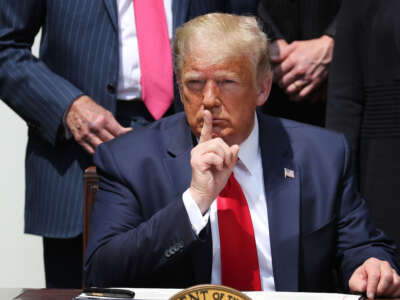 President Donald Trump shushes journalists before signing a bill in the Rose Garden at the White House on June 5, 2020, in Washington, D.C.