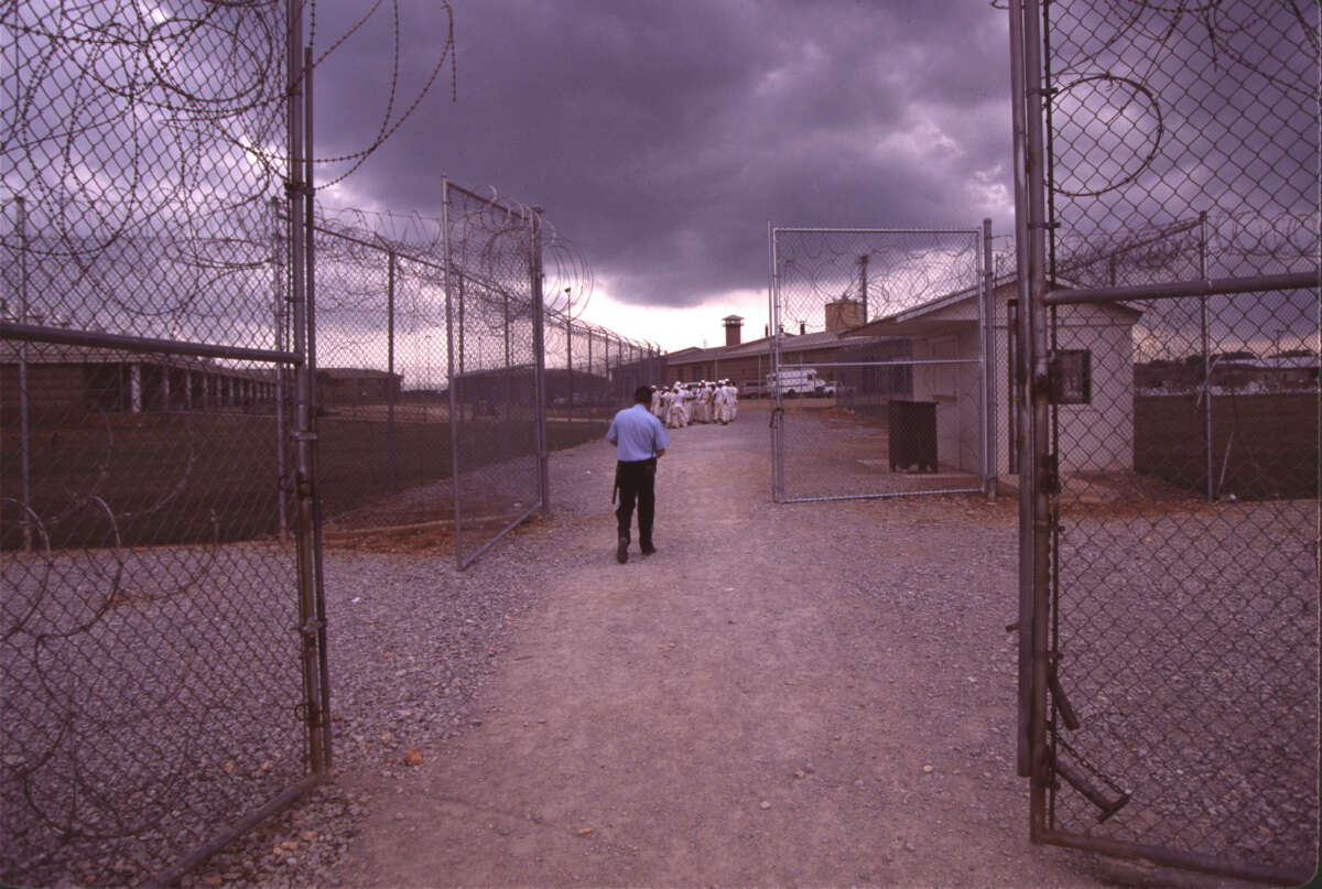 Convicts at the Limestone Correctional facility are placed on a chain gang when they leave the prison grounds for their daily labor as road crews in July of 1995 outside of Huntsville, Alabama.