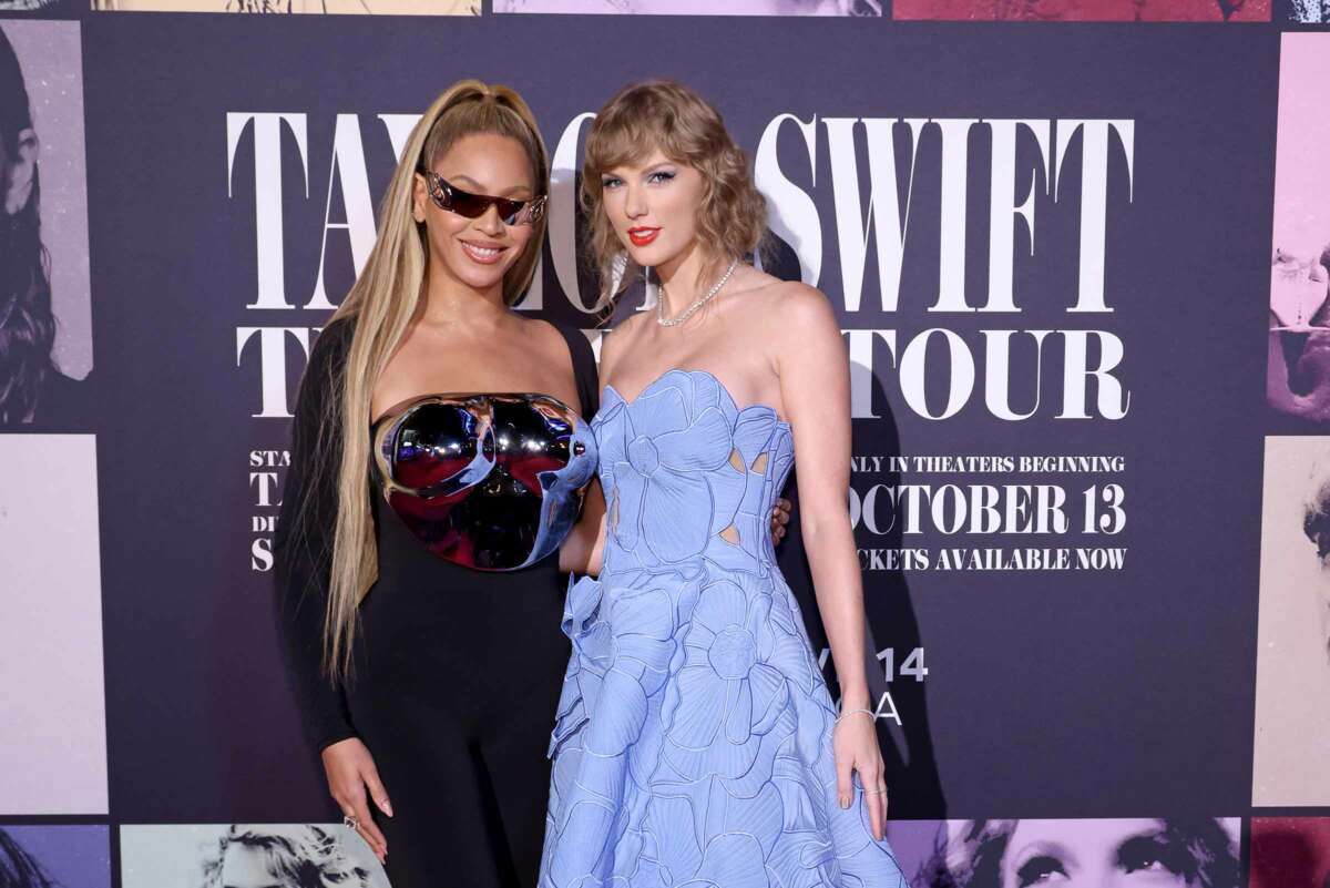 Beyoncé Knowles-Carter and Taylor Swift pose for a photograph outside of Taylor Swift's "Taylor Swift: The Eras Tour" movie